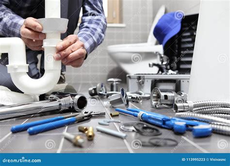 Plumber at Work in a Bathroom, Plumbing Repair Service, Assemble Stock Image - Image of handyman ...