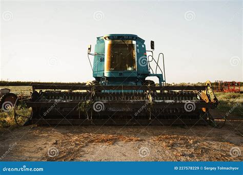 Blue Combine Harvester Agriculture Machine Harvesting in a Field Stock Image - Image of straw ...