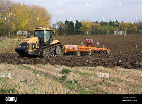 Tilling the soil Stock Photo - Alamy