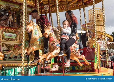 People Riding on Carousel Horse on Fairground Ride Editorial Stock ...