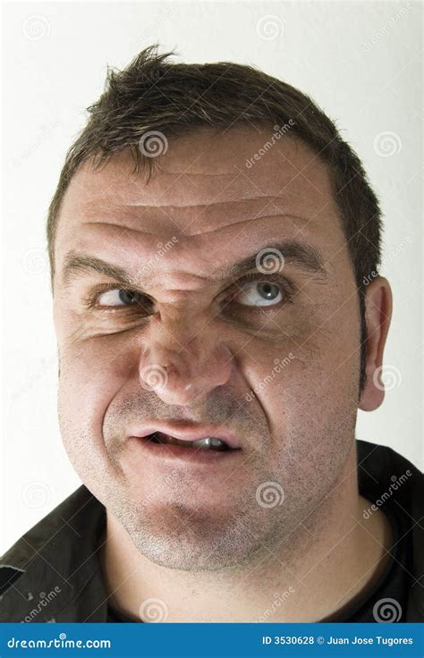 Scowling, angry man stock photo. Image of frowns, dislikes - 3530628