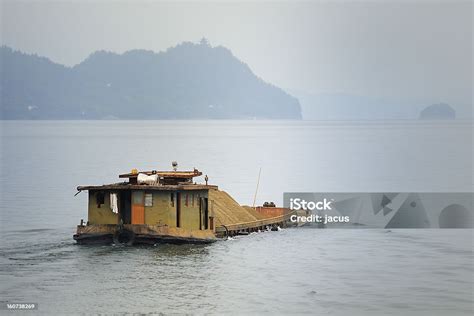 Sinking Barge Stock Photo - Download Image Now - Barge, China - East Asia, Excess - iStock