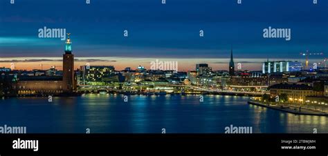 A picture of the city of Stockholm at night, showing the City Hall and ...