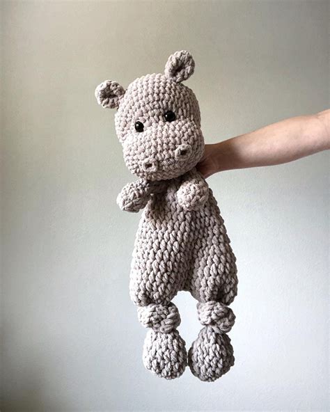 This super soft, plush and thick hand crocheted Hippo Snuggler will make the perfect addition to ...