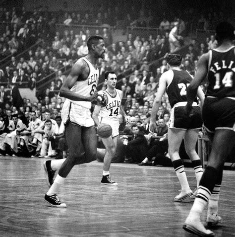 Bob Cousy and Bill Russell in action during Game 7 of the NBA Finals between the Boston Celtics ...