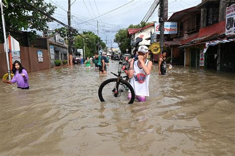 Tropical storm batters Philippines capital before exit