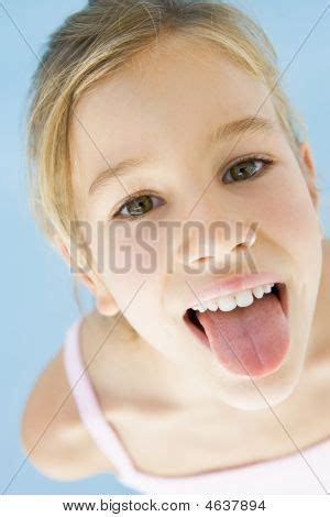 Young Girl Sticking Image & Photo (Free Trial) | Bigstock