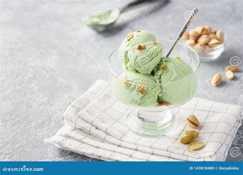 Pistachio Ice Cream in a Bowl with Chopped Nuts Stock Photo - Image of chopped, frozen: 143818480