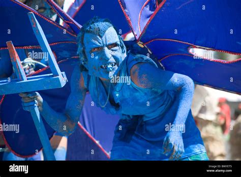 Trinidad Carnival; Playing Blue Devil mas Stock Photo - Alamy