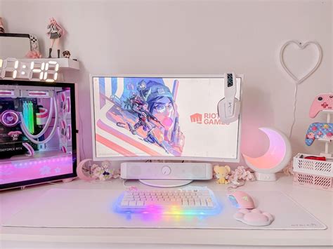 a desktop computer sitting on top of a white desk