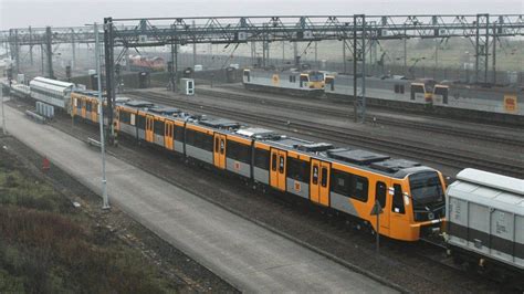 First new Tyne and Wear Metro train arrives in UK - BBC News