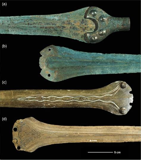 Four Early Bronze Age copper-damascened sword blades: (a) and (b) from... | Download Scientific ...