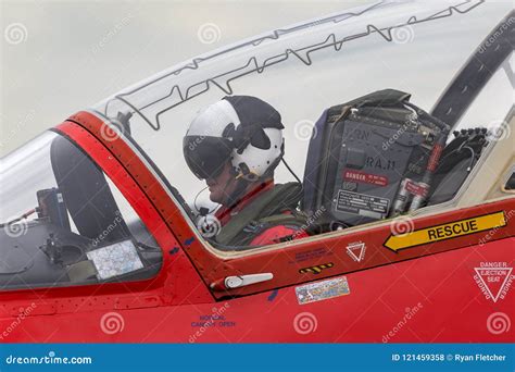 Royal Air Force Pilot Prepares For Takeoff In The Cockpit Of A Red ...