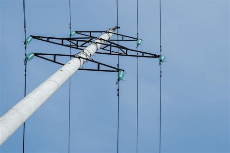 High-voltage concrete transmission tower on blue sky. 8905956 Stock ...