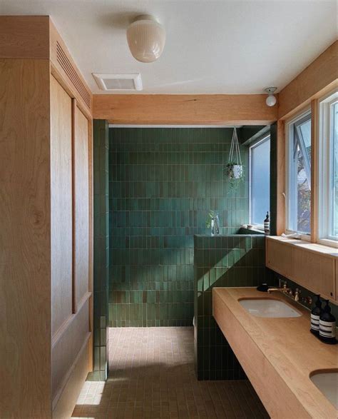 Modern Bathroom Design with Green Tile and Wooden Cabinets