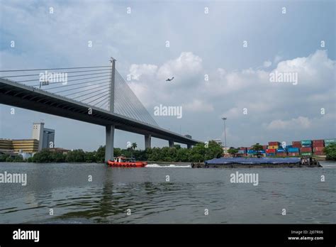 Seberang Perai, Penang, Malaysia - Circa Jun 2018: Tug boat carry goods cross Sungai Perai river ...