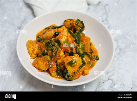 Ayam Woku or Chicken woku / Spicy Basil Chicken is a Indonesianfood ...