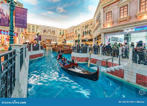 Gondolier Rides Tourists on Gondola Along Mock Canal of the Venetian ...