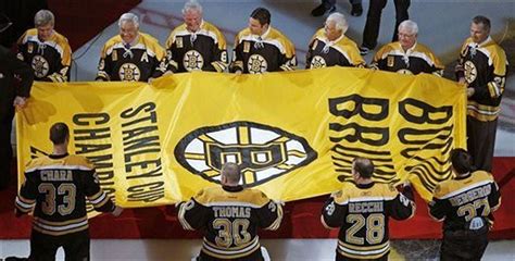 Boston Bruins celebrate championship season as banner is raised into TD ...