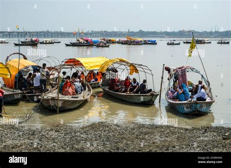 Allahabad, India - September 2020: Pilgrims in the Sangam going by boat ...