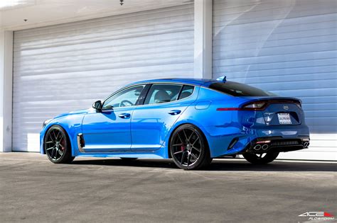 Redesigned Face of Blue Kia Stinger with Custom Mesh Grille — CARiD.com Gallery