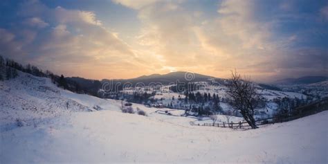 Winter mountains sunrise stock photo. Image of house - 84431222