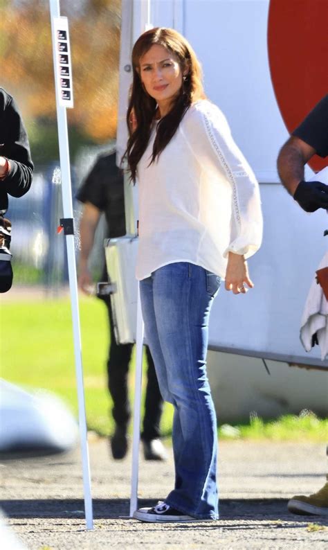 Jennifer Lopez in a White Blouse Filming Her New Movie Unstoppable at a ...