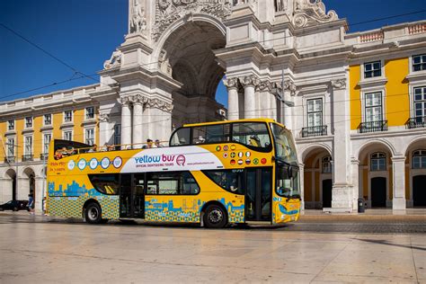 Discover Lisbon by bus, historical tramcar and a river Tagus cruise