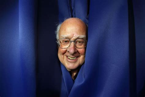 Professor Peter Higgs poses for a photograph