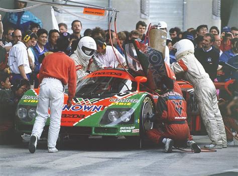 The 1991 Le Mans winning Mazda 787B in the pit for a driver change and ...