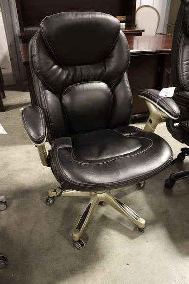 Black leather executive swivel office chair - Backes Commercial Auctioneers