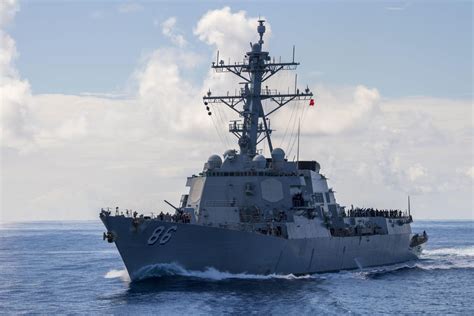 USS Shoup (DDG 86) prepares to pull alongside the aircraft carrier USS Nimitz (CVN 68) for a ...