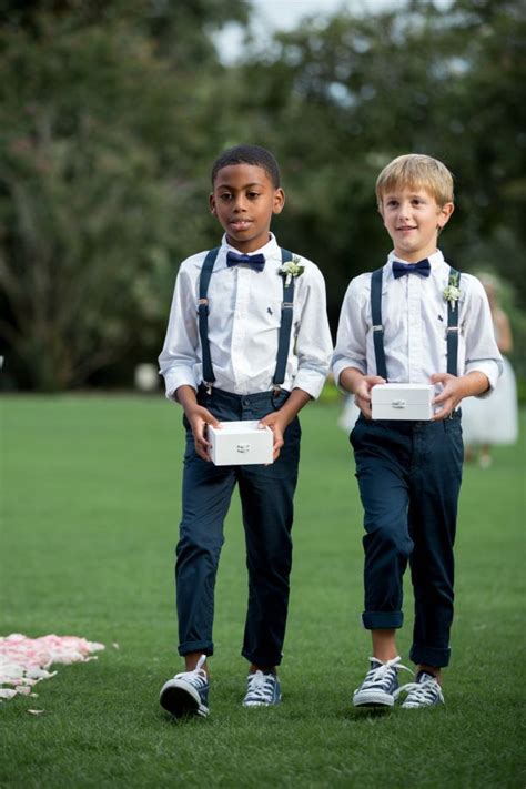 Little men in suspenders and converse! http://www.stylemepretty.com/little-black-book-blog/2017 ...