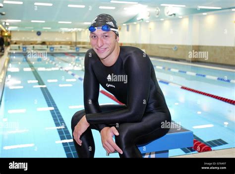 Sport swimming goggles swimming cap simming pool sitting ian thorpe hi-res stock photography and ...