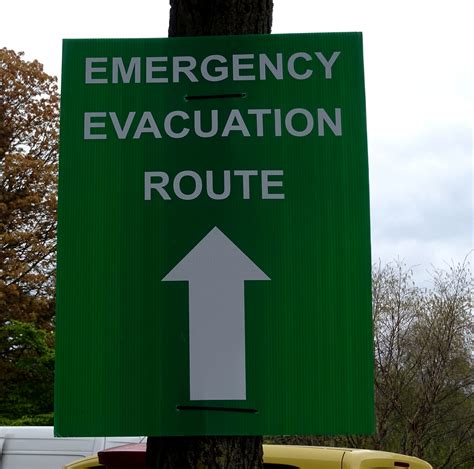 Emergency Evacuation Route Signpost Free Stock Photo - Public Domain Pictures