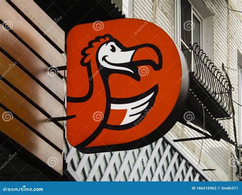 Dodo Pizza Logo And Restaurant Facade In The Street Editorial Image | CartoonDealer.com #220530560