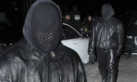 Kanye West goes incognito as he completely covers his face with mask