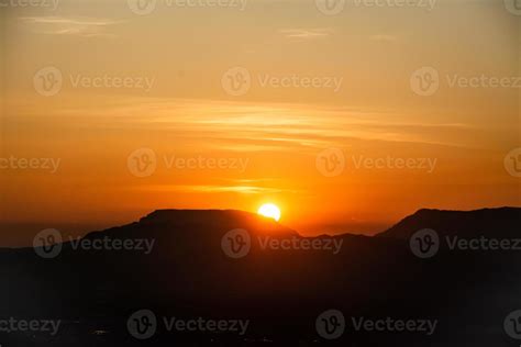 The sun was setting on the edge of the ridge Mountain. sunset 6338263 ...