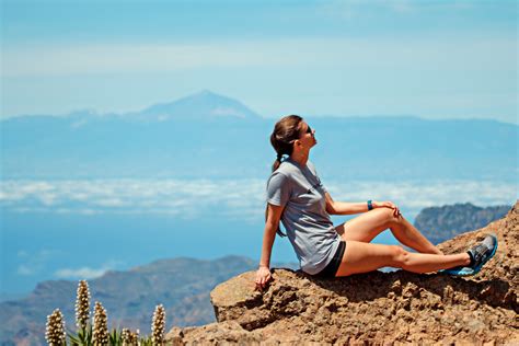 woman-sitting-on-top-of-a-mountain image - Free stock photo - Public ...