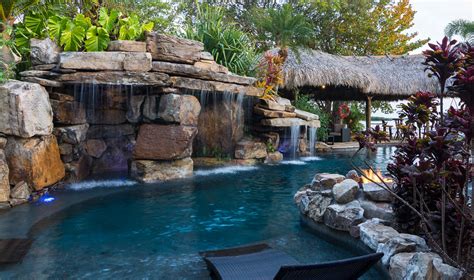 Custom Rock Waterfall Pool Grotto, Spa, Natural Stream, Tiki Hut