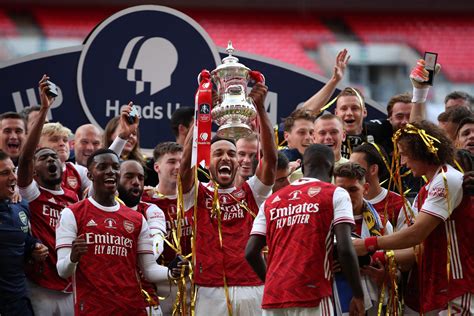 In pictures: Arsenal lift FA Cup trophy at empty Wembley Stadium after ...