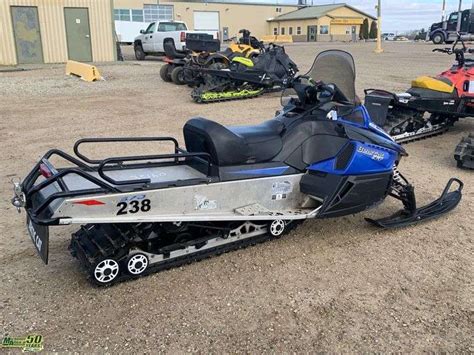 2013 Arctic Cat Bearcat Snowmobile - Michener Allen Auctioneering Ltd