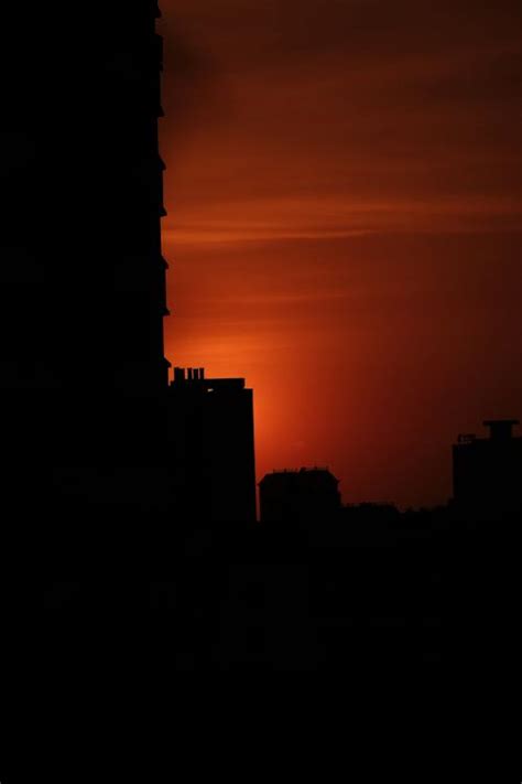 Silhouette of Building during Sunset · Free Stock Photo