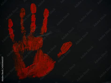 drawing bloody handprint on a black background Stock Photo | Adobe Stock