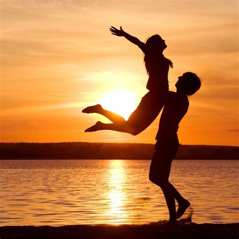 Lovers Flying Hug Under Sunset iPad Wallpapers Free Download