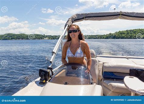 Pontoon Boat Tied To A Dock Stock Photo | CartoonDealer.com #72251592