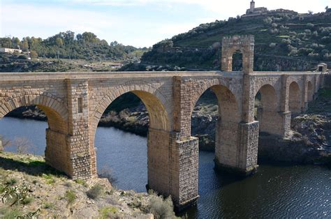 The Alcántara Bridge built over the Tagus River between 104 and 106 AD by a man named Caius ...