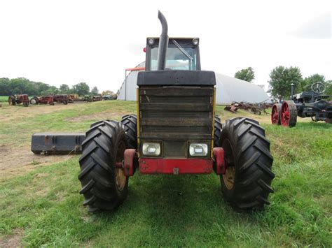 Lot 97C – Versatile 256 Bi-Directional Tractor with Bucket-WORK SAVER TREE SHEAR NOT NOT ...