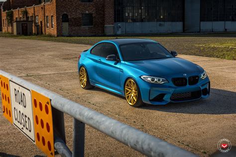 Interesting Color Combination: Blue BMW 2-Series on Gold Rims — CARiD.com Gallery