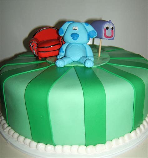 Green kids birthday cake with blue clues cake toppers with thinking ...